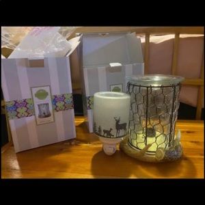 Two scentsy deer warmers